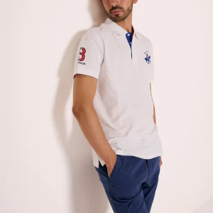 Polo in piquet con ricami e dettagli a contrasto